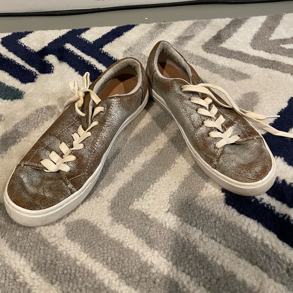 Silver TOMS sneakers